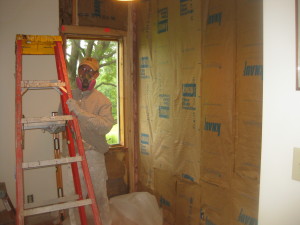 New insulation. That's newly returned staff member Tom Klintworth behind the mask.